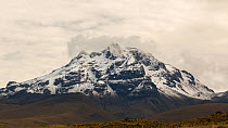 Sincholagua Volcano (4,899m) after a heavy snowfall, the summit now only occasionally has snow, and its glaciers have melted due to climate change, Cotopaxi National Park, Ecuador, 2018. (non-ex)