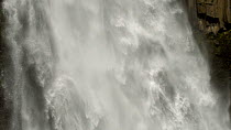 Slow motion tilt shot looking down to Cascada Magica (Magic Waterfall), Rio Malo Valley, Sucumbios Province, Ecuador Amazon, 2017. (non-ex)