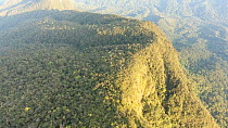 Aerial shot tracking over a 1800m high tepui, Nangartiza Valley, Zamora Chinchipe Province, Ecuador, 2018. (non-ex)