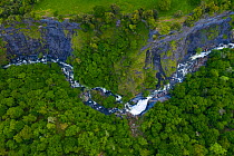 Gandara River waterfall and deciduous woodland. Soba Valley, Valles Pasiegos, Cantabria, Spain. May 2019.