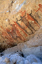Prehistoric rock painting of Pronghorn antelope and people. La Pintada cave. San Francisco Sierra, El Vizcaino Biosphere Reserve, Baja California Peninsula, Mexico.