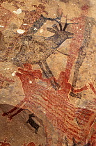 Prehistoric rock painting at La Pintada cave, Pronghorn antelope, Bighorn sheep and people depicted, San Francisco Sierra, El Vizcaino Biosphere Reserve, Baja California Peninsula, Mexico.