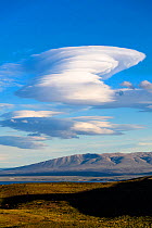 Lenticular clouds above Torres del Paine National Park. Patagonia, Chile. November 2018.