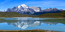 Towers and Central Massif reflected in Laguna Amarga, Torres del Paine National Park, Patagonia, Chile. November 2018.