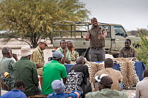 A meeting at a farming co-operative run by members of Cheetah Conservation Botswana (CCB) and the Department of Wildlife and National Parks. Phale Max Seele from CCB is talking to farmers to help supp...