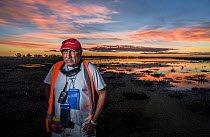 Laurie Levy, Head of the Coalition Against Duck Shooting, standing on the shoreline of the Kerang Wetlands, Victoria, Australia, to protest the start of another duck hunting season. Concerned about th...