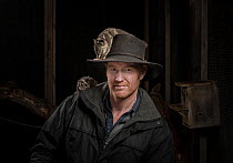 Co-founder of the Conservation Ecology Centre in the Otways Shane Neal with his captive Sugar Gliders (Petaurus breviceps). July 2018, Conservation Ecology Centre, the Otways, Victoria, Australia.  Ed...