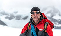 Environmental explorer Tim Jarvis on a glacier on Shakelton Gap, King Haakon Bay, South Georgia. November, 2018. Editorial use only.