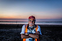 Portrait of Laurie Levy, Head of the Coalition Against Duck Shooting, standing on the shoreline of the Kerang Wetlands, Victoria, Australia, to protest the start of another duck hunting season. Concer...