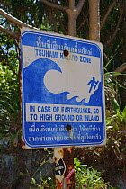 Tsunami warning sign on Maya Beach, Koh Phi Phi, Thailand, an area devastated by 2005 tsunami.