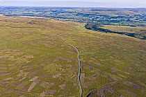 Aerial image showing patchwork pattern where moor has been burnt on rotation for maximising habitat to breed Red Grouse for driven grouse shooting. Grinton Moor above Swaledale, Yorkshire Dales, Engla...