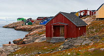 Brightly painted houses of Ittoqqortoormlit village, Scoresby Sund, East Greenland, August, 2019.