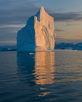 Iceberg at sunset, Northwest Fjord, Scoresby Sund, Greenland, August.