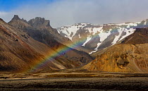 Rainbow in mountain landscape. Iceland 2016