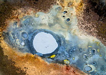 Aerial view of a mud pool in the Gunnuhver geothermal area, Iceland. May.