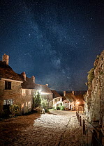 Gold Hill at night, with the Milky Way above, Shaftesbury, Dorset, England, UK, August 2018.