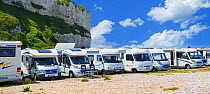 Motorhomes parked along the French coast at Saint-Valery-en-Caux in summer, Seine-Maritime, Normandy, France 2019