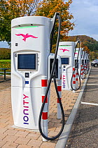 High-power-charging / HPC units, rapid charger for electric vehicles / electric cars at service station in Germany