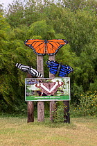 Information sign with painted butterflies at National Butterfly Center. The organisation is fighting in court to prevent construction of the USA-Mexico border wall through the 100 acre nature preserve...