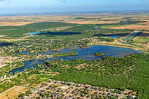 View from La Joya across Walker Lake to Las Palomas Wildlife Mangement Area, Rio Grande and Tamaulipas, Mexico beyond. Hidalgo County, Texas, USA. July 2019.