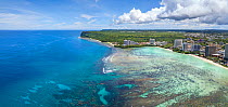 Aerial panorama of the north end of Tumon Bay with hotels and beach and Two Lovers Point, Guam, Micronesia, Mariana Islands, Pacific Ocean. September 2017.