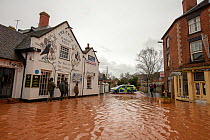 Flooded Teme Street, Tenbury Wells with Police response vehicle, Storm Dennis, Worcestershire, 16 February 2020.