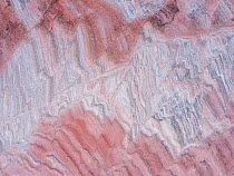 Patterns in sandstone representing a petrified view of shifts in the sand dunes, laid down in the Jurassic. Colorado Plateau, Arizona, USA.