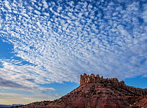 Circle Cliffs under cloudy sky. Grand Staircase-Escalante National Monument, Colorado Plateau, Great Basin Desert, Utah, USA. October 2019.