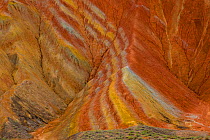 Striped rock in the Rainbow Mountains, strata within eroded hills of sedimentary conglomerate and sandstone. Zhangye National Geopark, China Danxia UNESCO World Heritage Site, Gansu Province, China. 2...