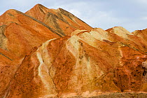 Eroded hills of sedimentary conglomerate and sandstone. Zhangye National Geopark, China Danxia UNESCO World Heritage Site, Gansu Province, China. 2018.