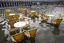 Outdoor seating during flooding in Venice, Italy, December 2019. Editorial use only.