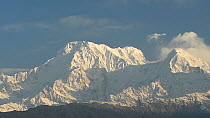 Panning shot of Annapurna South (7,219m) and Patal Hiunchuli (6,434m) mountains, Nepal, 2019.