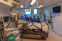 ICU team working together with a MICU team (consisting of an anesthesiologist and a nurse) from the Radboud University Nijmegen to transfer the patient to another hospital in the north of the Netherla...