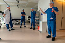 Anesthesia nurse instructing the anesthesiologists on the use of the intubating room in the emergency department. This room was created especially to intubate Covid-19 infected patients and has a capa...