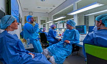 ICU nurses, anesthesia nurses, operation assistants in conversation with each other during the night shift on the Corona ICU Jeroen Bosch Ziekenhuis, Den Bosch, The Netherlands April 2020. EDITORIAL...
