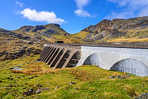 Dam at Llyn Stwlan used for pumped storage hydroelectricity generation situated in the Moelwyn Mountains above Tanygrisiau reservoir near Blaenau Ffestiniog, North Wales, UK, April 2018.
