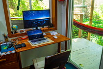 Photographer Tui De Roy&#39;s office space, during the Covid-19 lockdown. Santa Cruz Island, Galapagos Islands April 2020