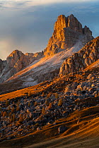 Sunset light on spires at Passo Giau, Dolomites, Italy, October 2019.
