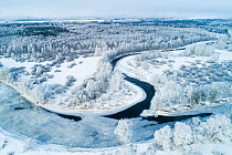 Aerial view of half frozen Suur Emajagi river, Tartumaa county, Southern Estonia. January 2019.