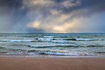 Rain and hail clouds over the Baltic Sea on the coast of Saaremaa island, Western Estonia. November.
