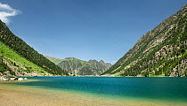 Shoreline around Lac de Gaube, Pyrenees National Park, France, June.