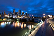 Melbourne cityscape at dawn, view of Yarra River and Princes Bridge, Melbourne city and Southbank. Victoria, Australia. May 2016.