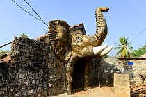 Elephant sculpture around an entrance of the Royal Palace. Dassa, Benin, 2020.