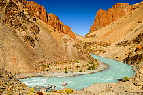 Tsarap River with pale blue water from glacial melt, and surrounding valley. Zanskar, Ladakh, India. September 2011.