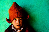 Young novice, portrait. School of the Karsha Gompa, a Buddhist monastery at 3650m altitude founded in the 10th Century. Padum Valley, Zanskar, Ladakh, India. 2011.