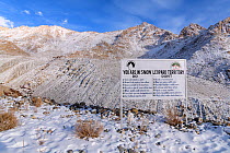 Sign when entering snow leopard (Panthera uncia) territory, listing what to do and not to do, Ladakh Ranges, Himalayas, Ladakh, India.