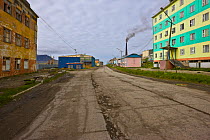 View of the main street in Provideniya, Russia. Provideniya is situated at the edge of Komsoloskaya Bay, Bering Sea, Russia.