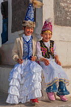 Local Kazakh girls at the Eagle Hunters festival near Ulgii, Western Mongolia. October 2008.