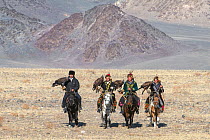 Mongolian Kazakh eagle hunters , arriving at the Festival Site, Altai mountain range in western Mongolia.