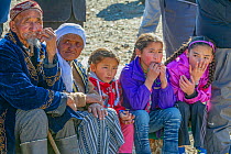 Kazakh family, local spectators at the Eagle Hunters festival near Ulgii, Western Mongolia October 2011.